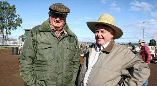 Barry Geitz and John Leeson relax after a busy morning rattling off goods to eager buyers. Barry Geitz and John Leeson relax after a busy morning rattling off goods to eager buyers.